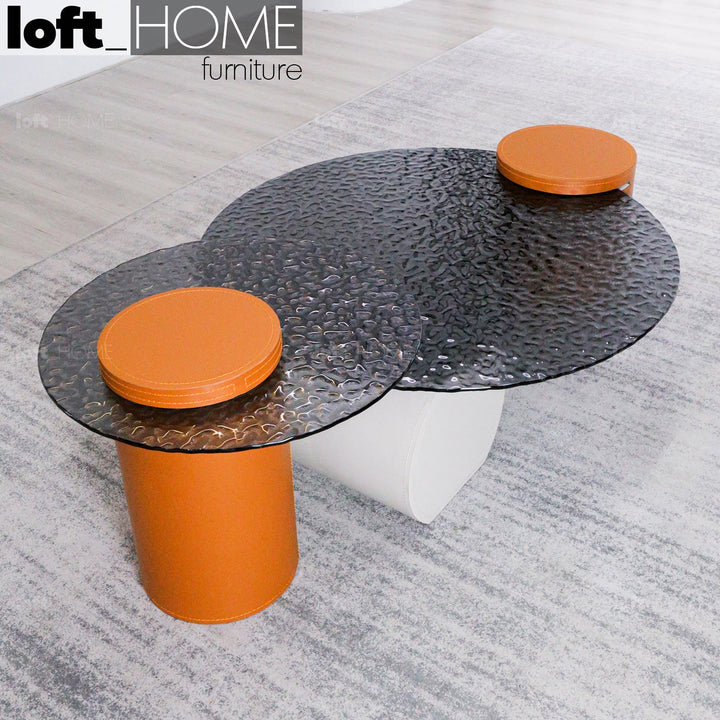 Modern fused glass coffee table verre particulier leather in real life style.