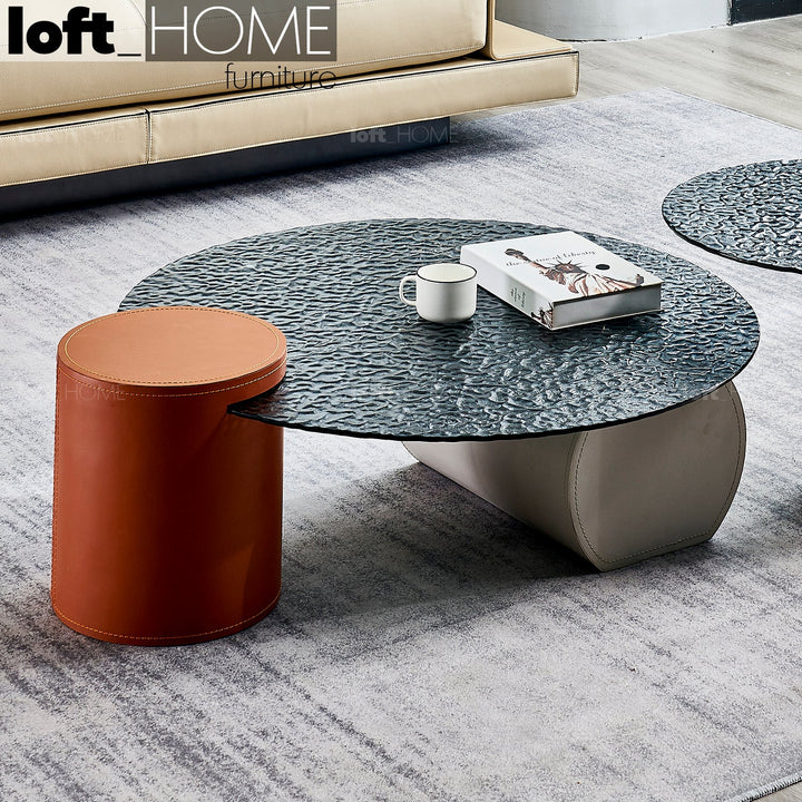 Modern fused glass coffee table verre particulier leather primary product view.