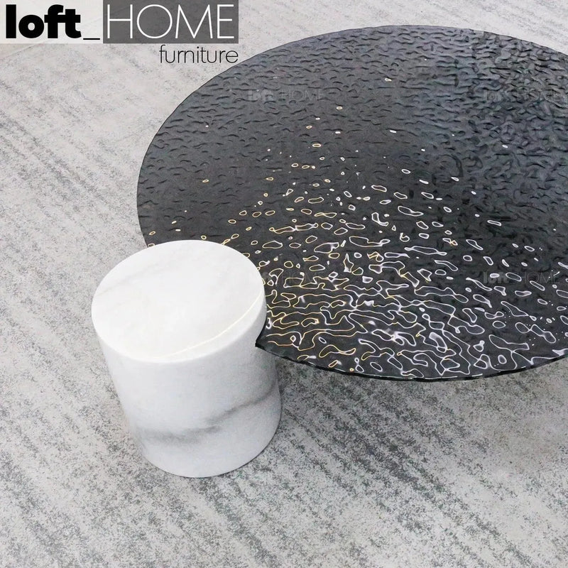 Modern fused glass coffee table verre particulier marble with context.
