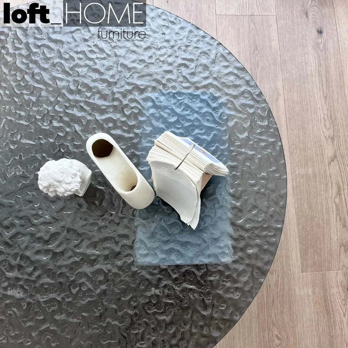 Modern fused glass coffee table verre particulier marble in close up details.
