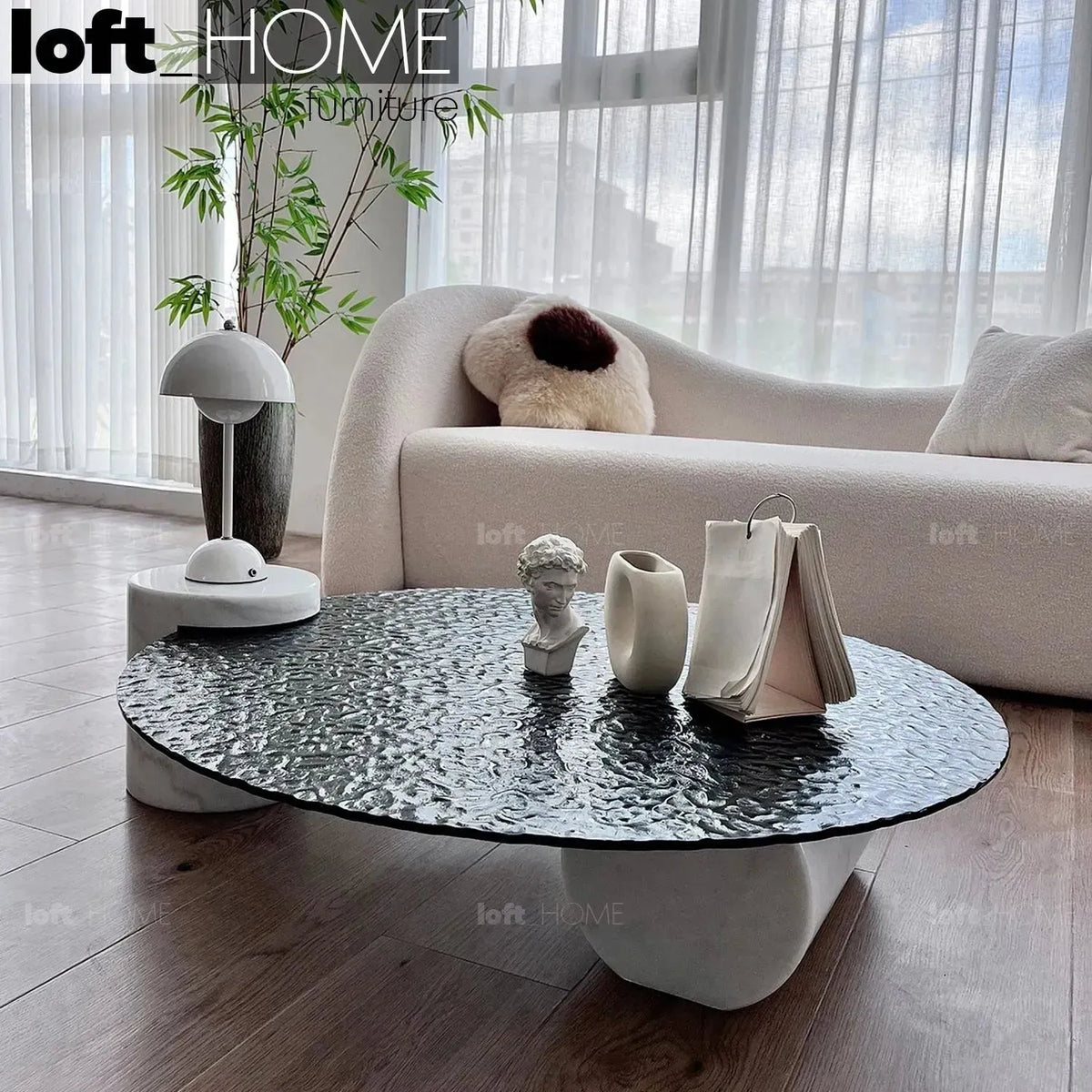 Modern fused glass coffee table verre particulier marble in still life.