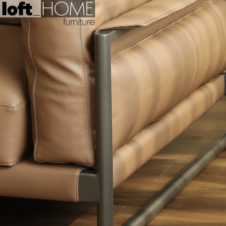 Modern genuine leather 1 seater sofa tara in close up details.