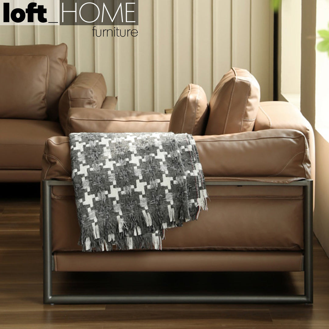 Modern genuine leather 1 seater sofa tara with context.