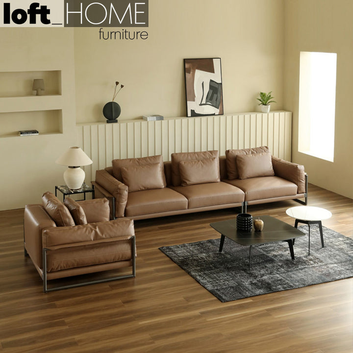 Modern genuine leather 4 seater sofa tara in real life style.