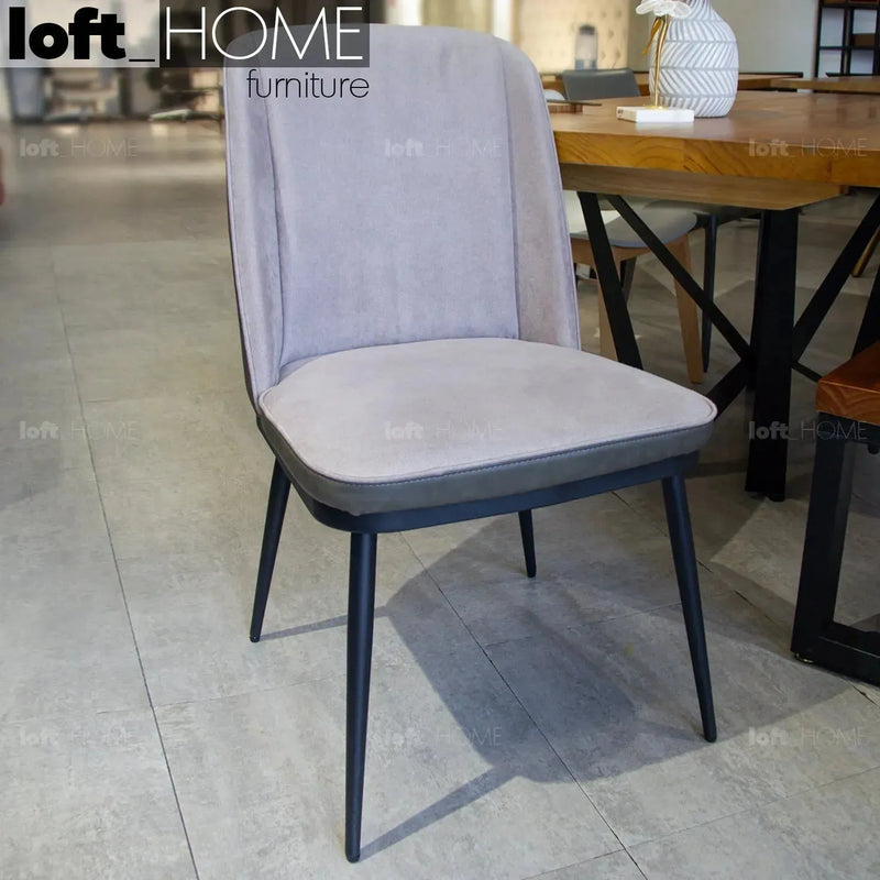 Modern fabric and leather dining chair metal man n10 in real life style.