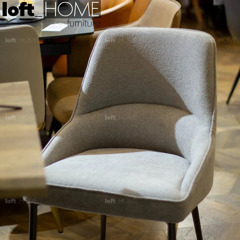 Modern fabric and leather dining chair metal man n14 in details.