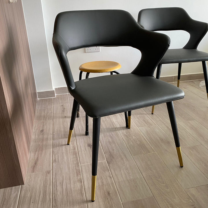 Modern leather dining chair metal man n2 in panoramic view.