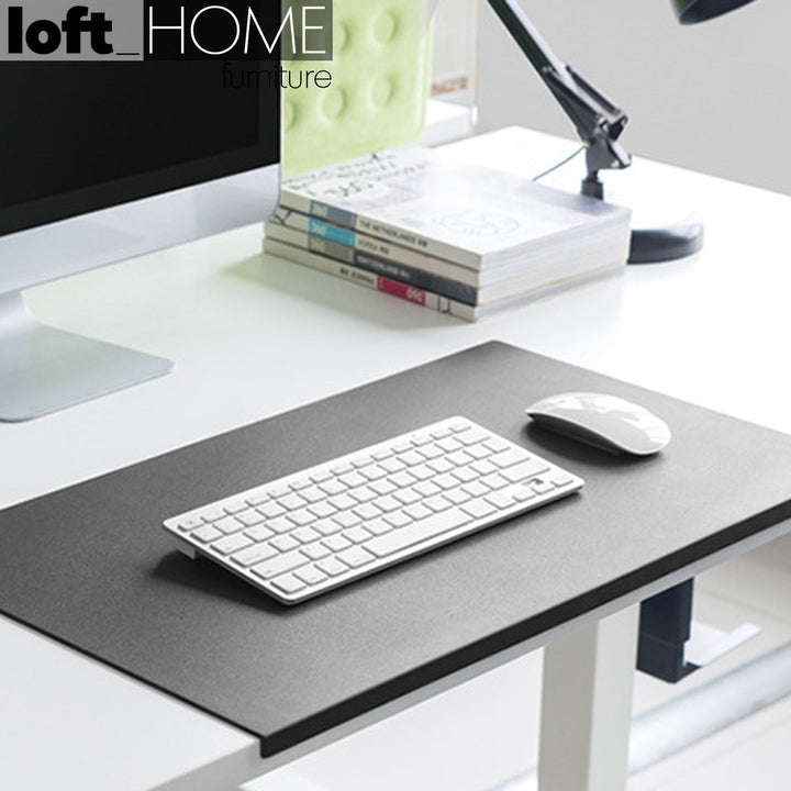 Modern leather smooth desk mat with fixation lip decor primary product view.
