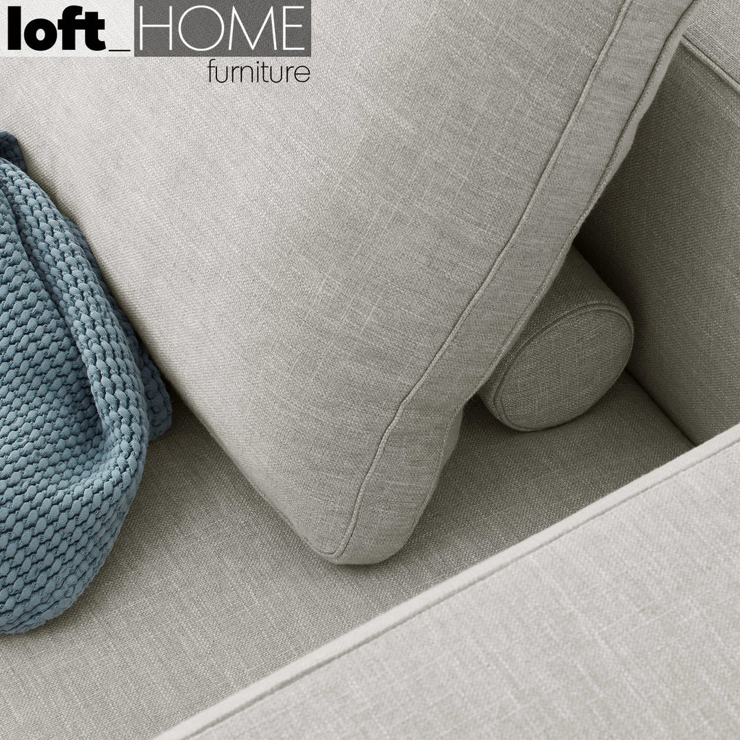 Modern linen 2 seater sofa nocelle in close up details.
