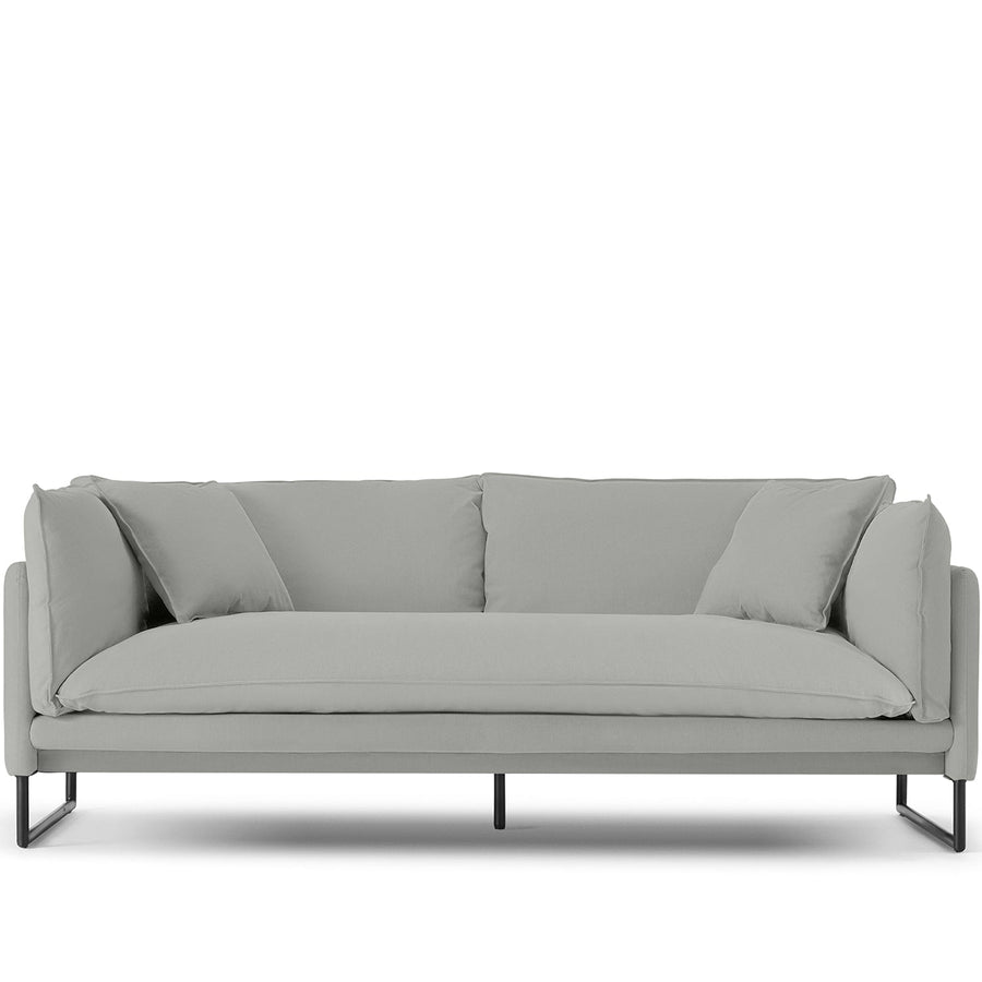 Modern linen 3 seater sofa malini in white background.