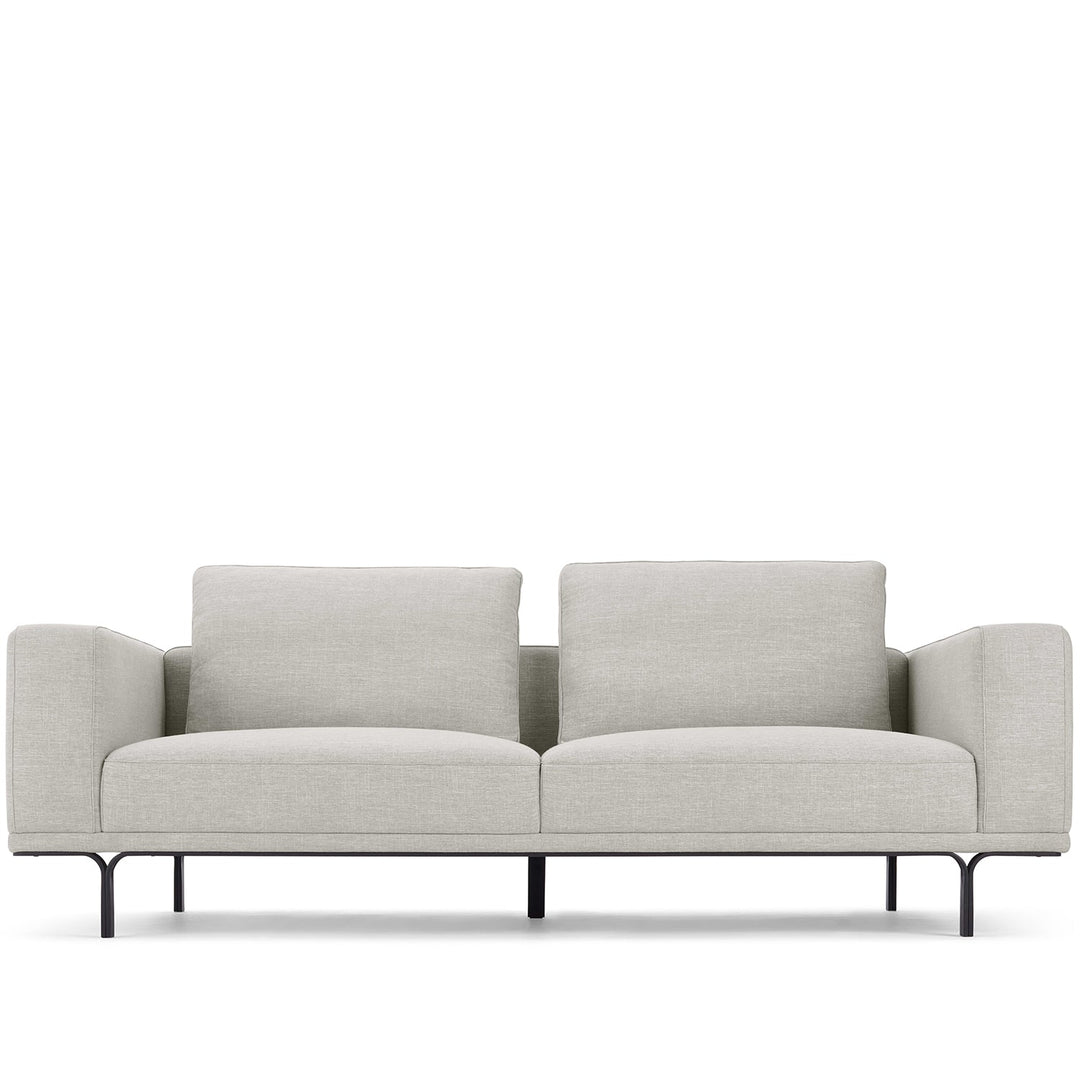 Modern linen 3 seater sofa nocelle in white background.