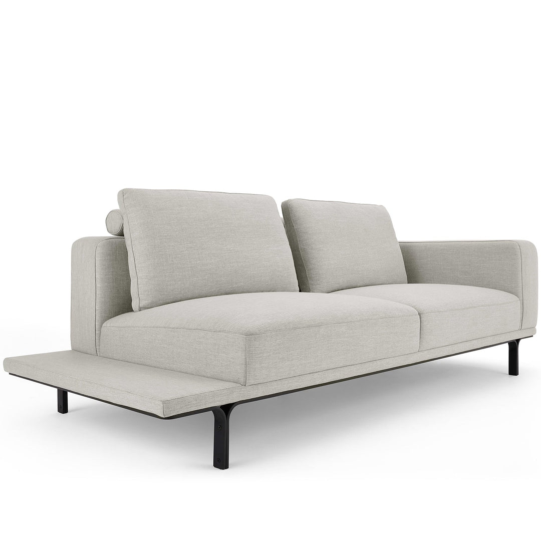 Modern linen 3 seater sofa with side table nocelle situational feels.