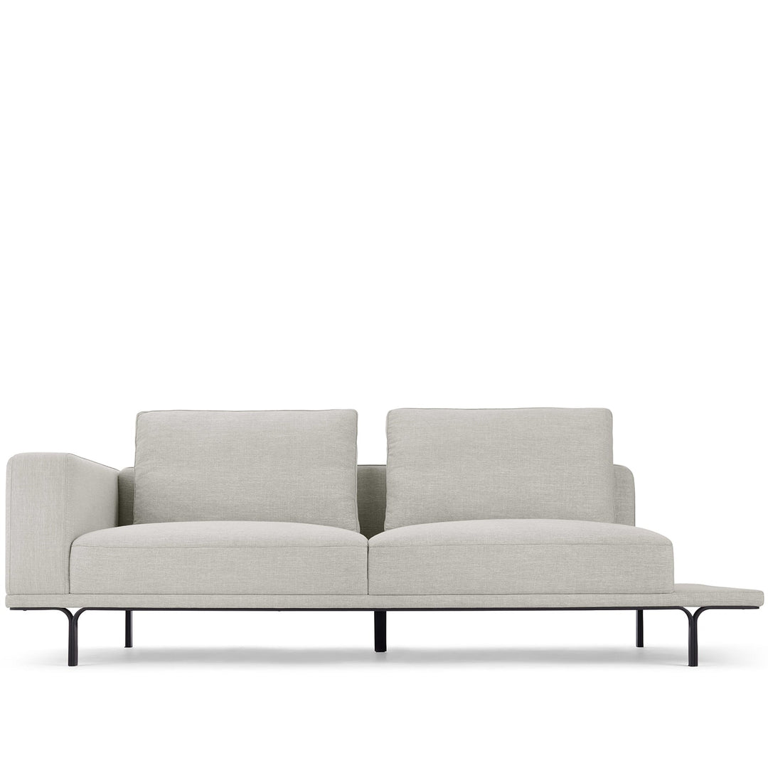 Modern linen 3 seater sofa with side table nocelle in white background.