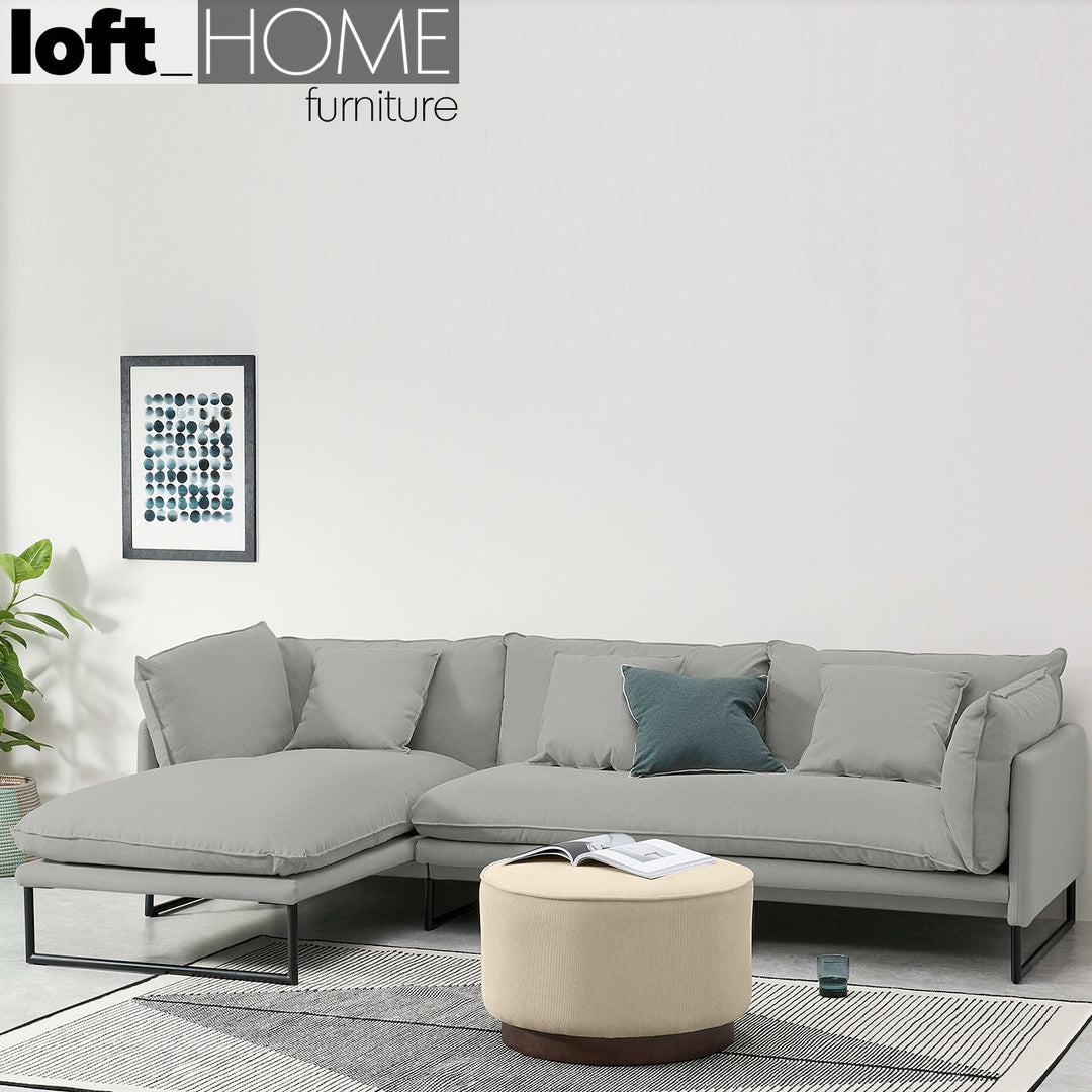 Modern linen l shape sectional sofa malini 2+l in still life.