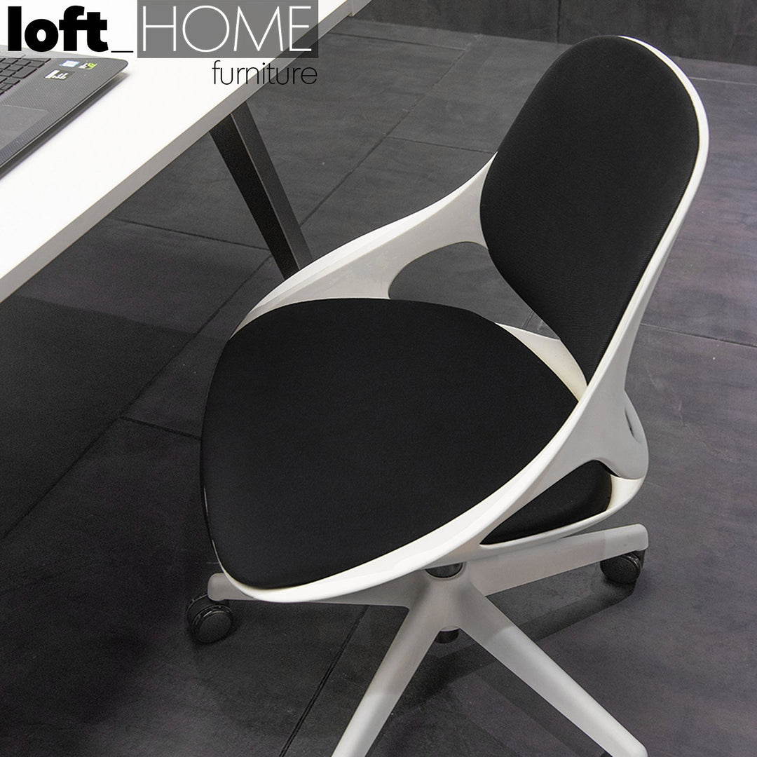 Modern mesh ergonomic office chair zone in real life style.