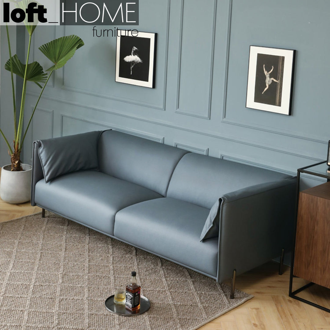 Modern microfiber leather 2 seater sofa beam in close up details.