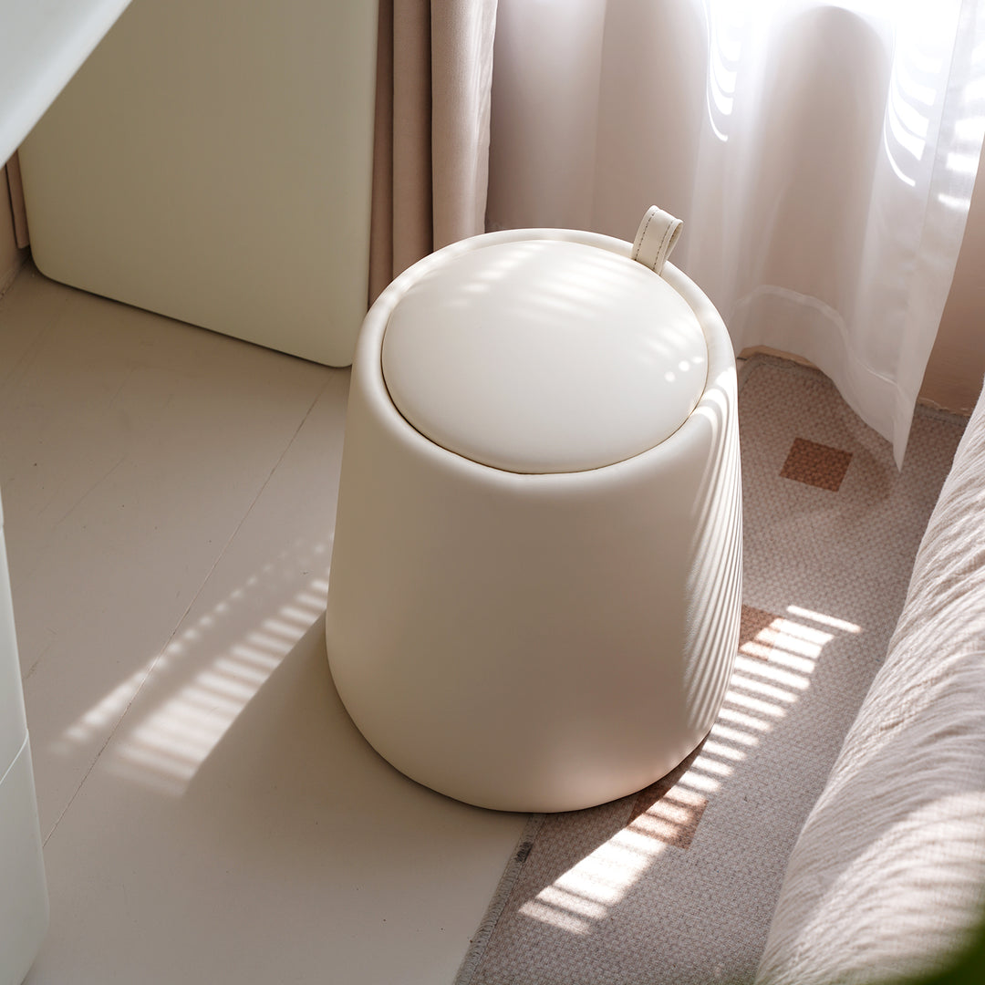 Modern microfiber leather dressing stool pudding in still life.