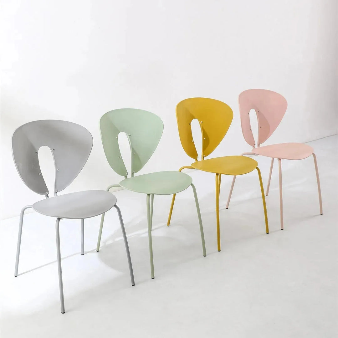 Contemporary plastic dining chair globus material variants.