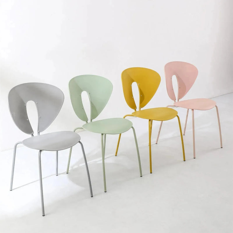 Contemporary plastic dining chair globus material variants.