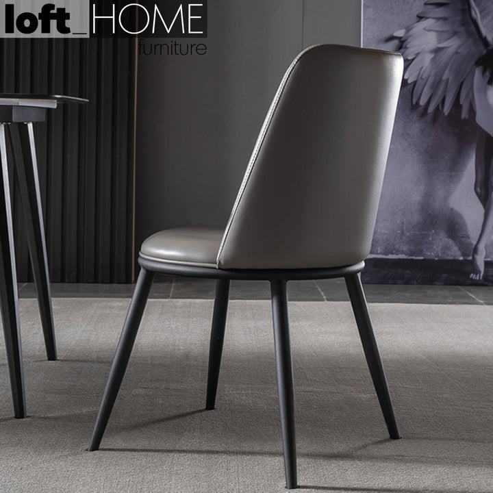 Modern pu leather dining chair dimgray in real life style.