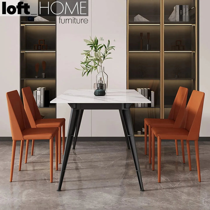 Modern pu leather dining chair orange with context.