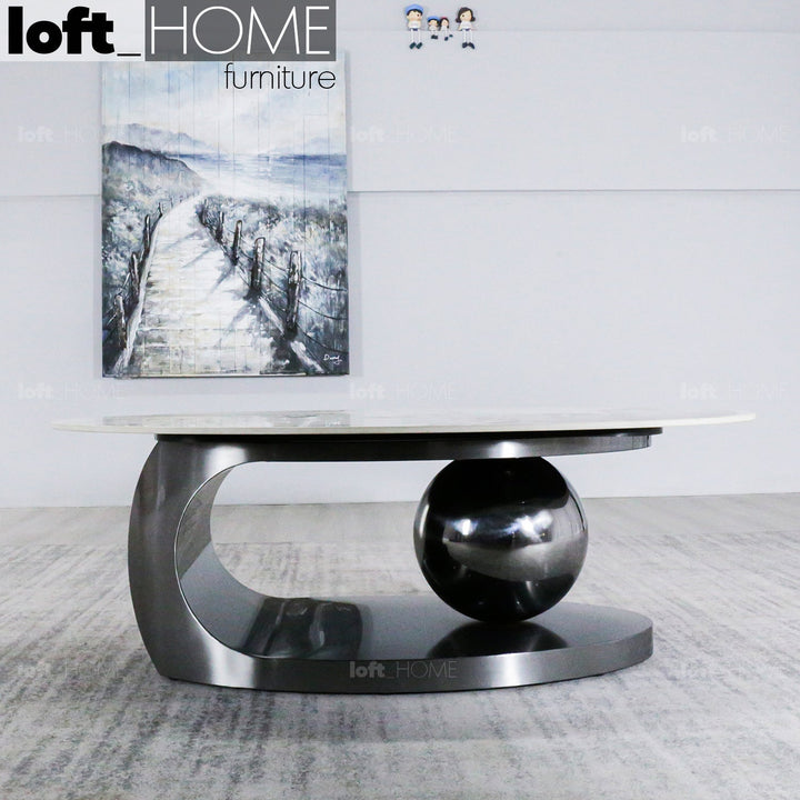 Modern sintered stone coffee table globe black in details.