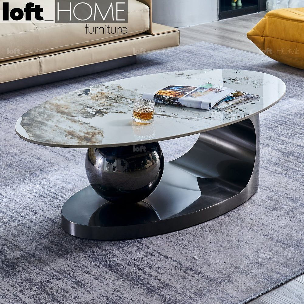 Modern sintered stone coffee table globe black primary product view.