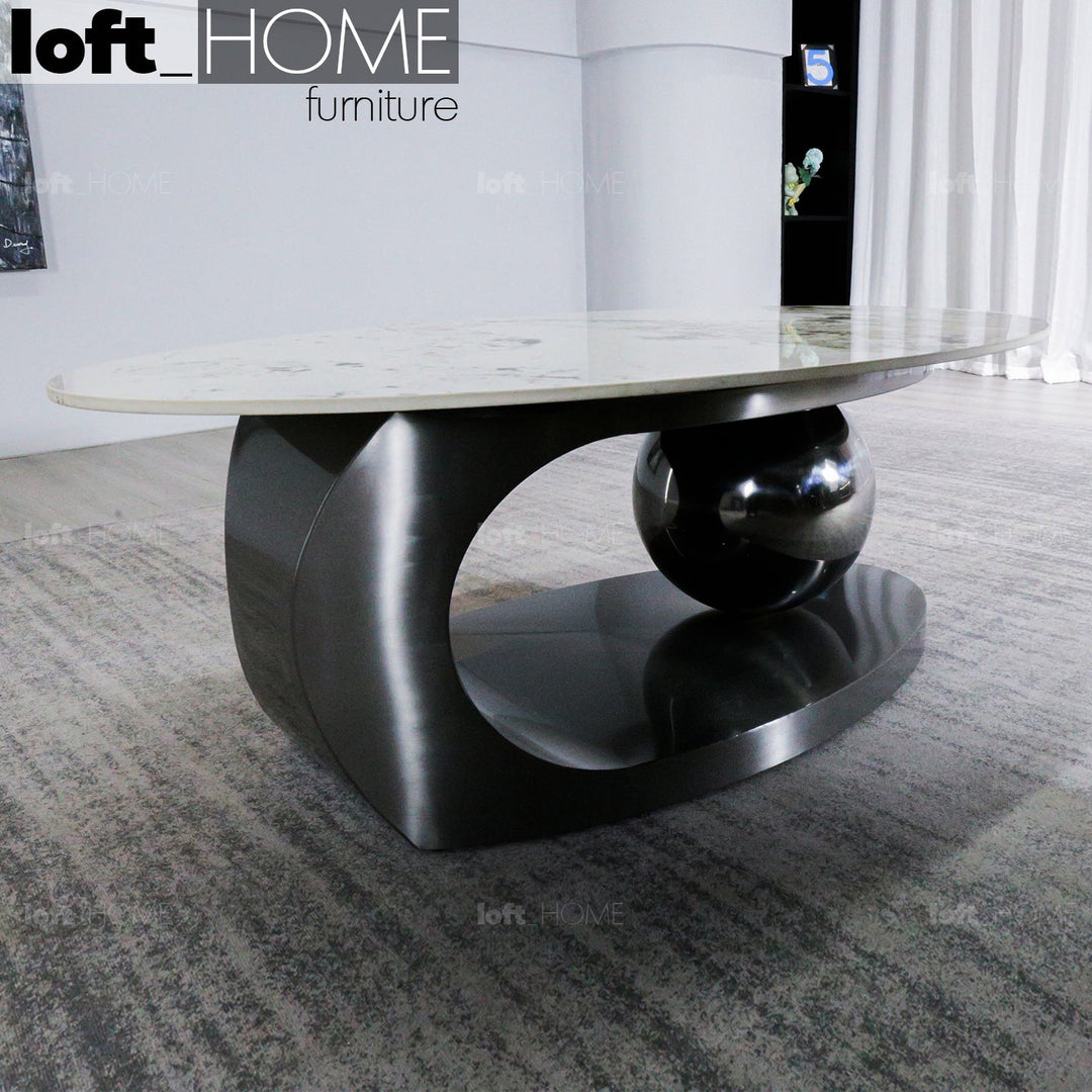 Modern sintered stone coffee table globe black in close up details.