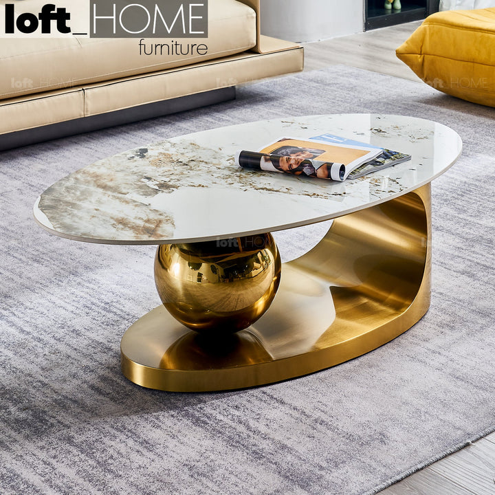 Modern sintered stone coffee table globe gold primary product view.