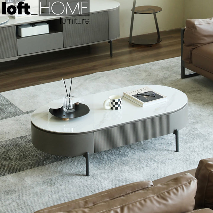 Modern sintered stone coffee table rosa in real life style.