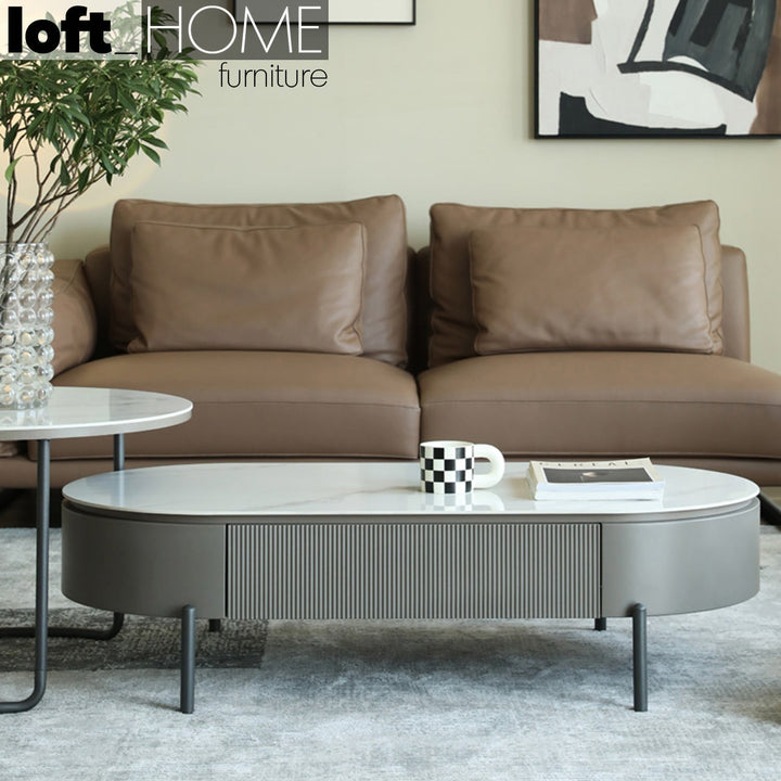 Modern sintered stone coffee table rosa with context.