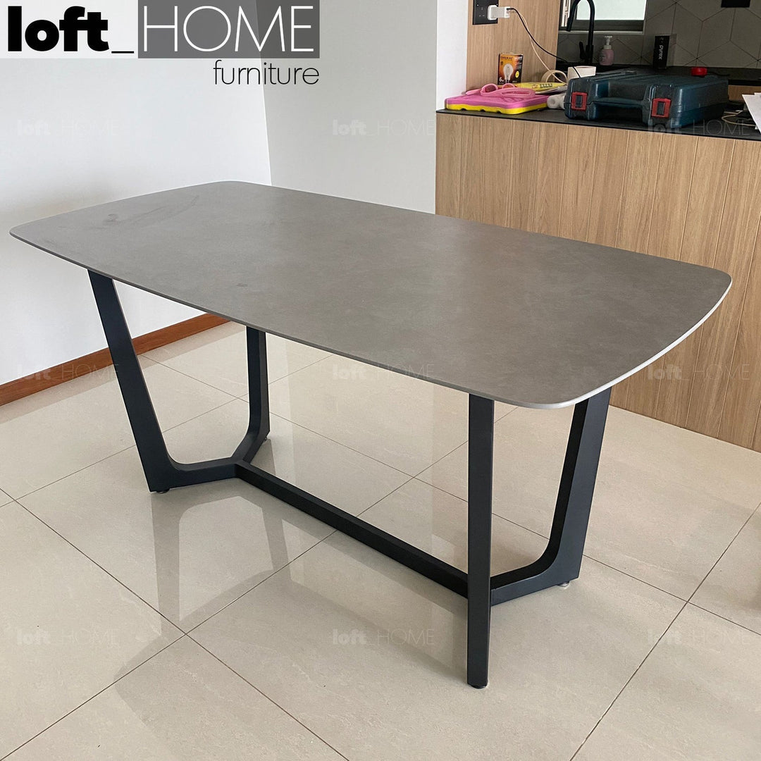 Modern sintered stone dining table chelsea black with context.