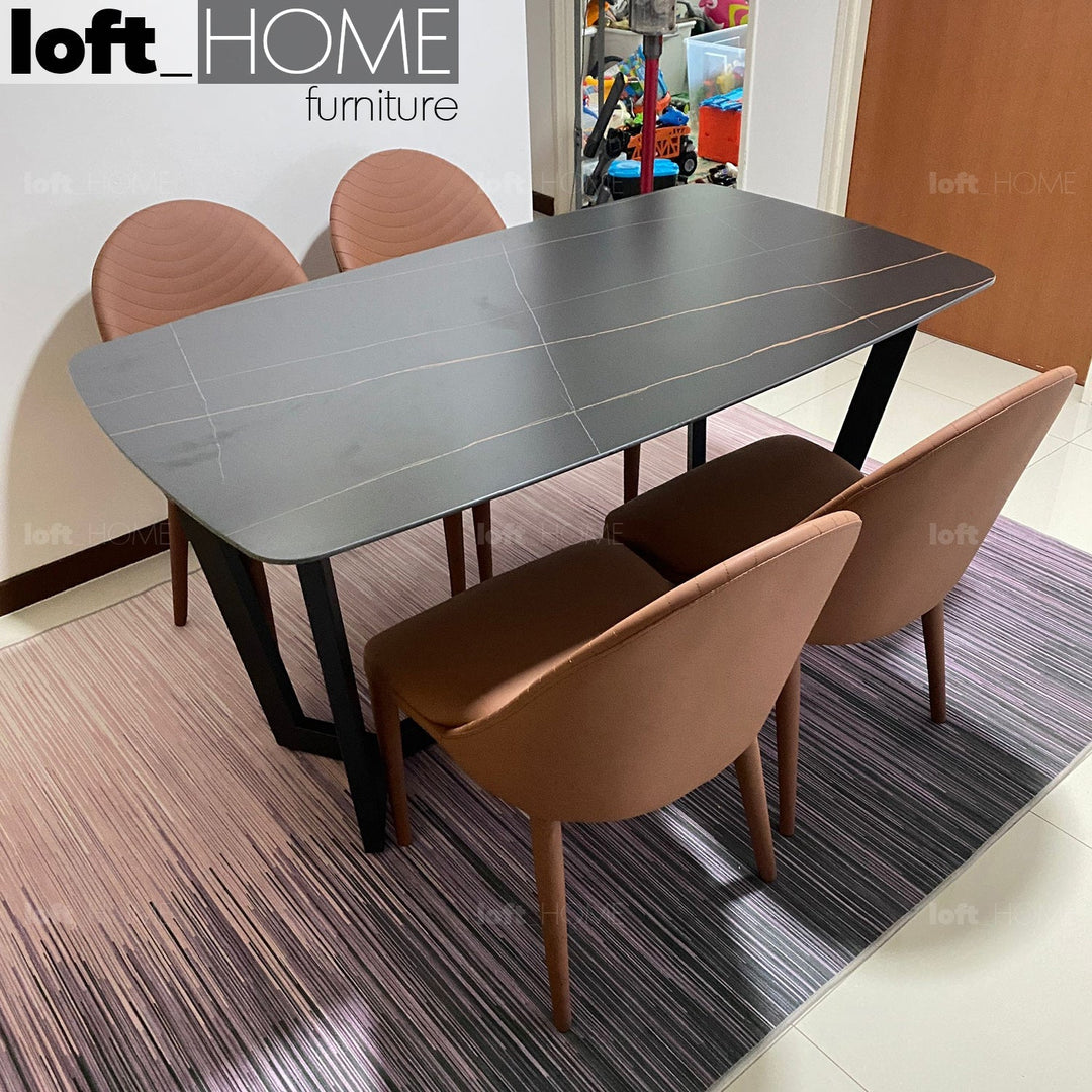 Modern sintered stone dining table chelsea black in real life style.