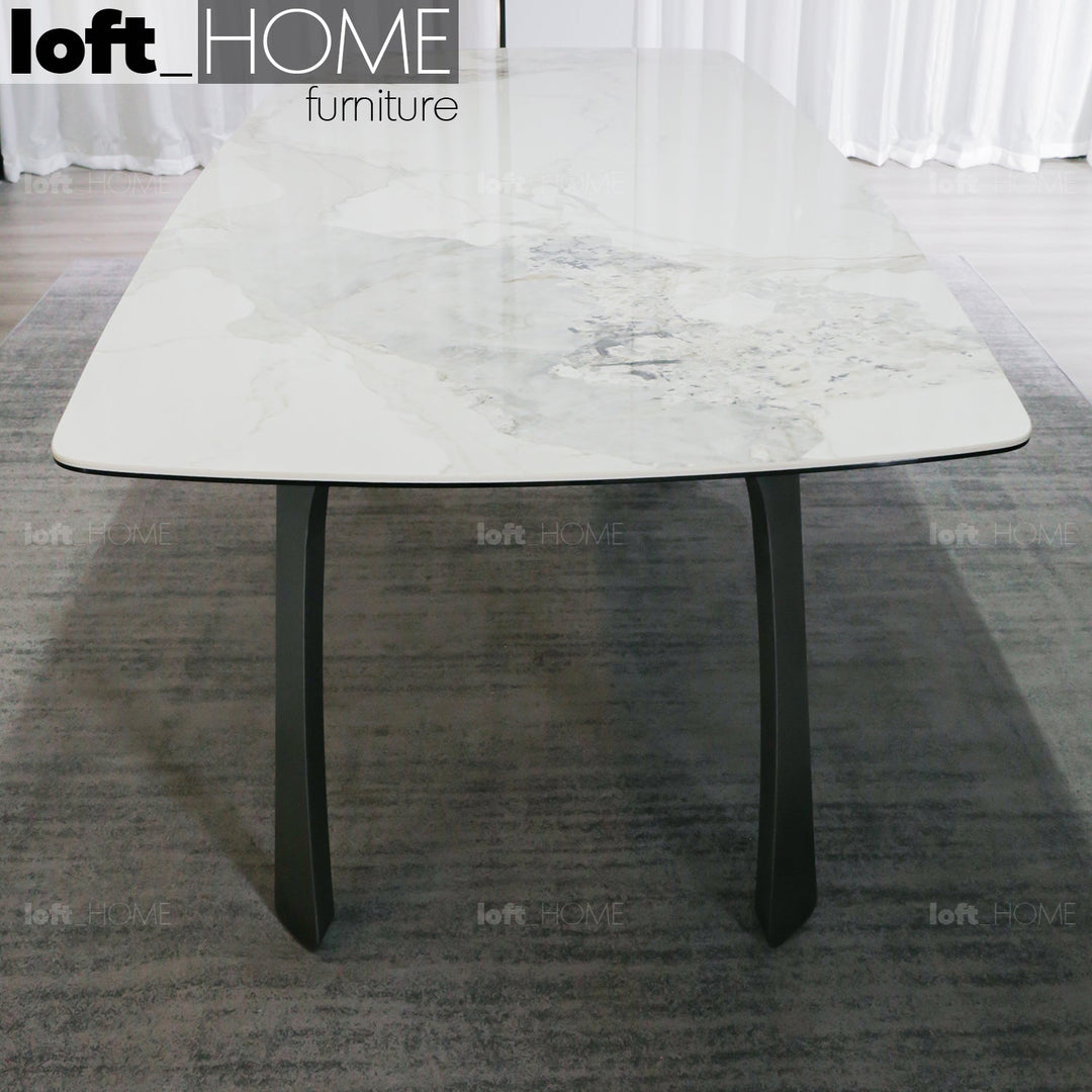 Modern sintered stone dining table fly grey in close up details.