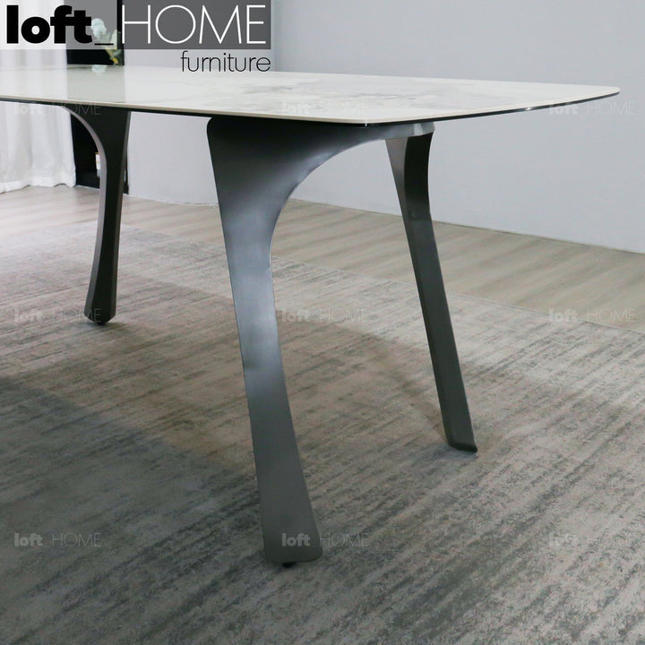 Modern sintered stone dining table fly grey in panoramic view.