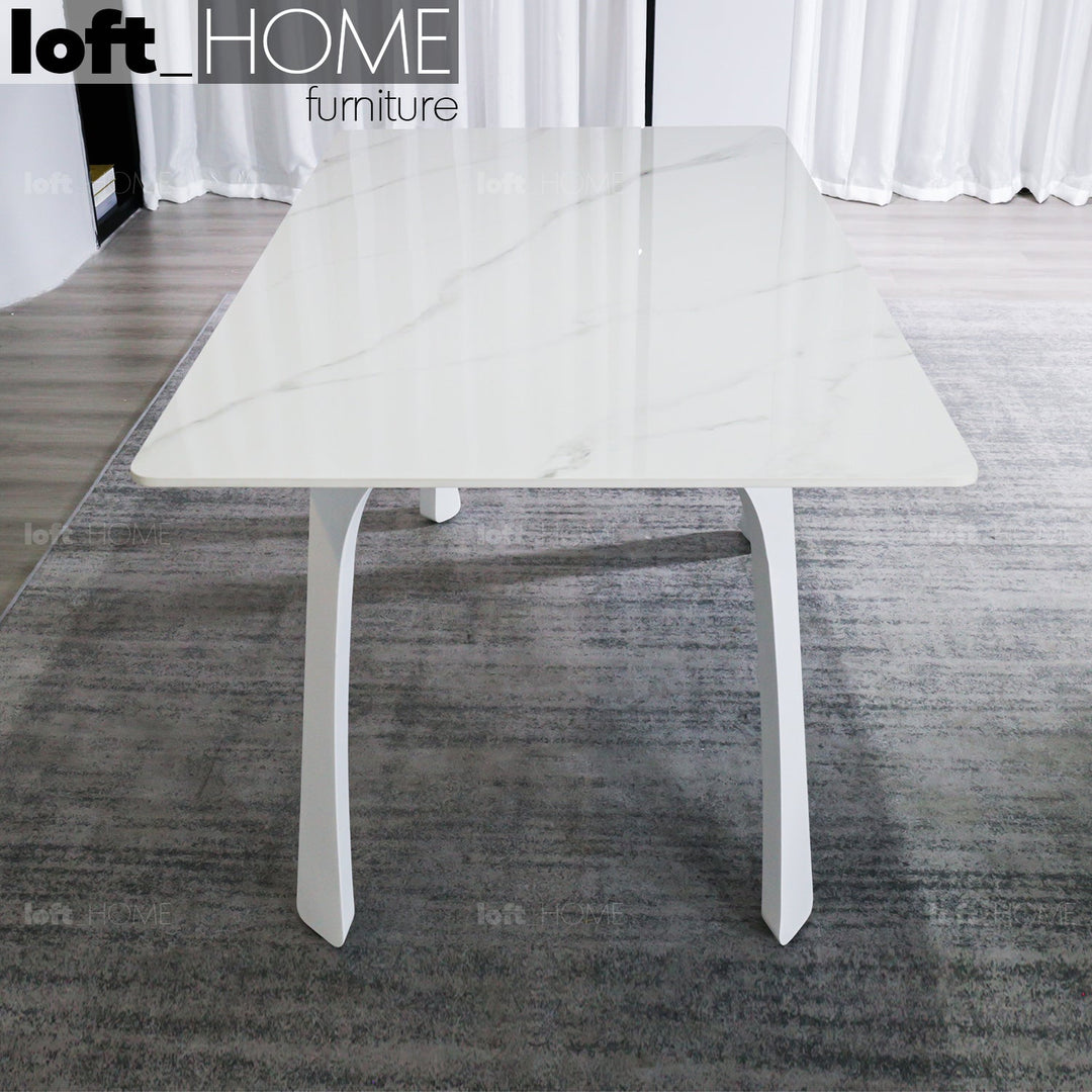 Modern sintered stone dining table fly white in details.