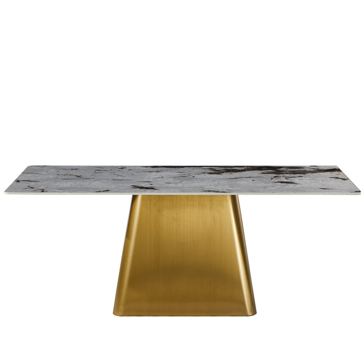 Modern sintered stone dining table haku gold in white background.