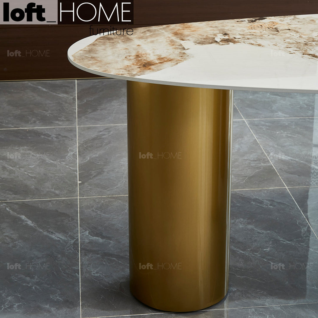 Modern sintered stone dining table lagos gold in details.