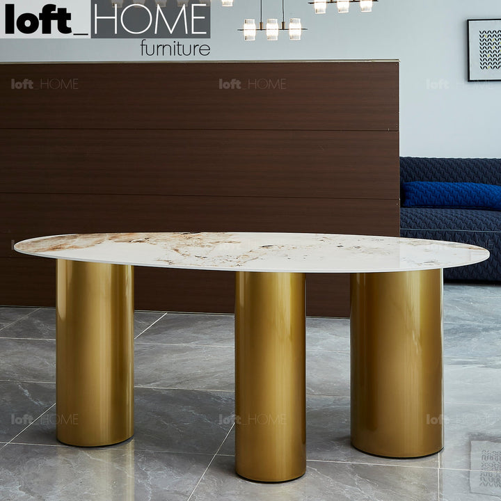 Modern sintered stone dining table lagos gold in real life style.