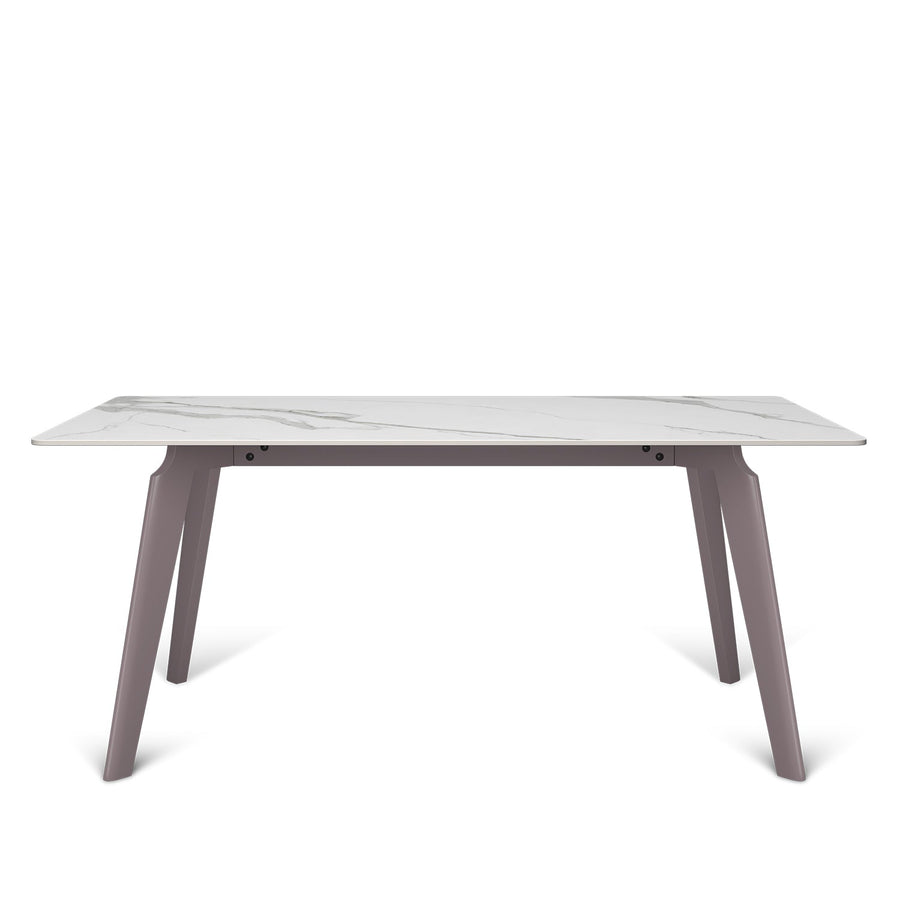 Modern sintered stone dining table leggy in white background.