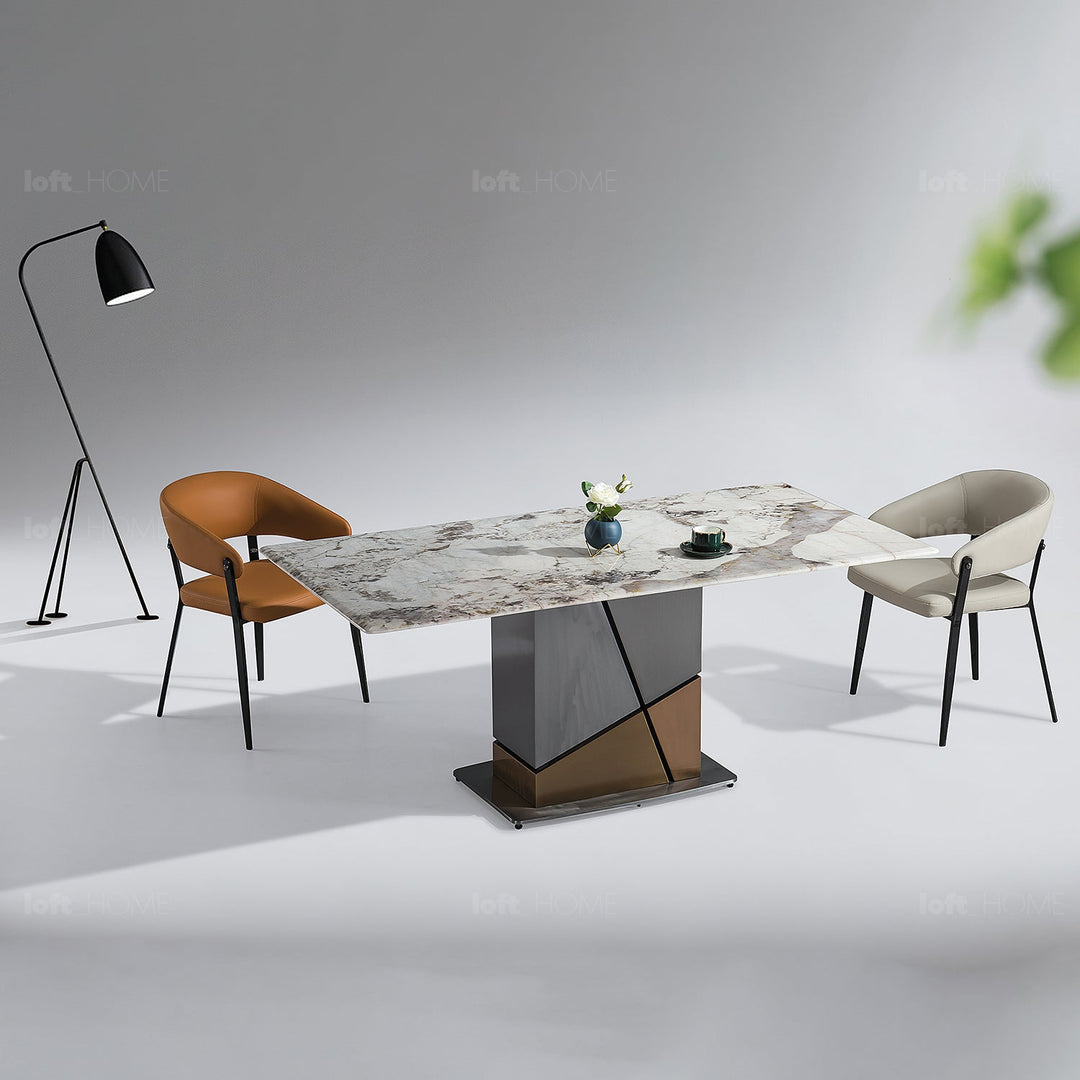 Modern sintered stone dining table sculptural with context.