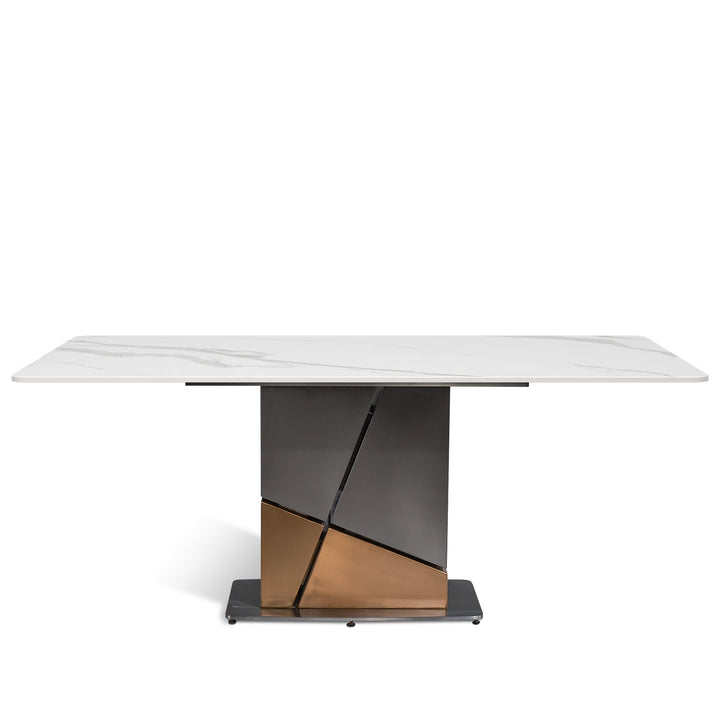 Modern sintered stone dining table sculptural in white background.