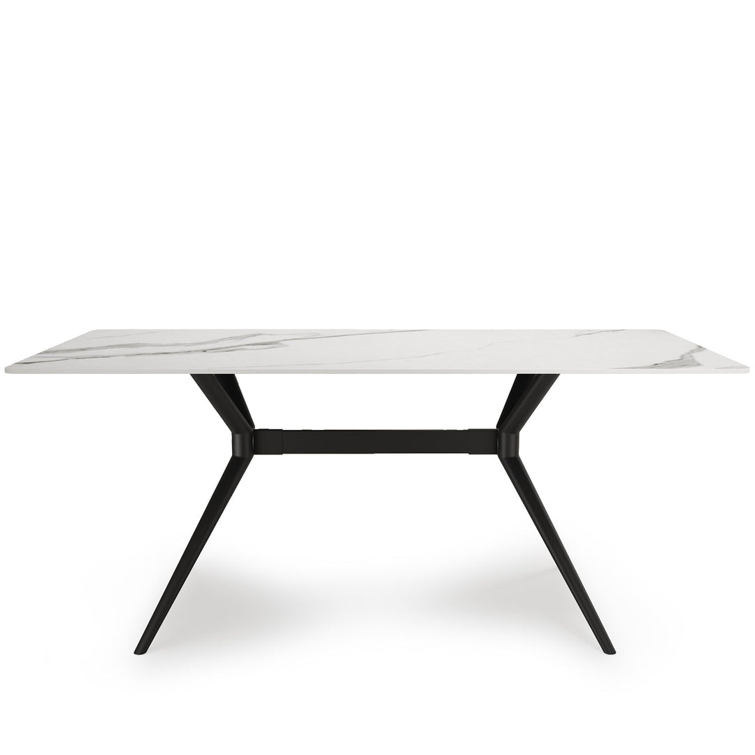 Modern sintered stone dining table spider black in white background.
