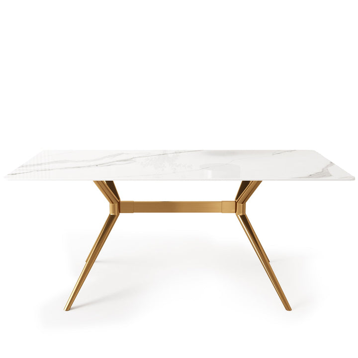 Modern sintered stone dining table spider gold in white background.