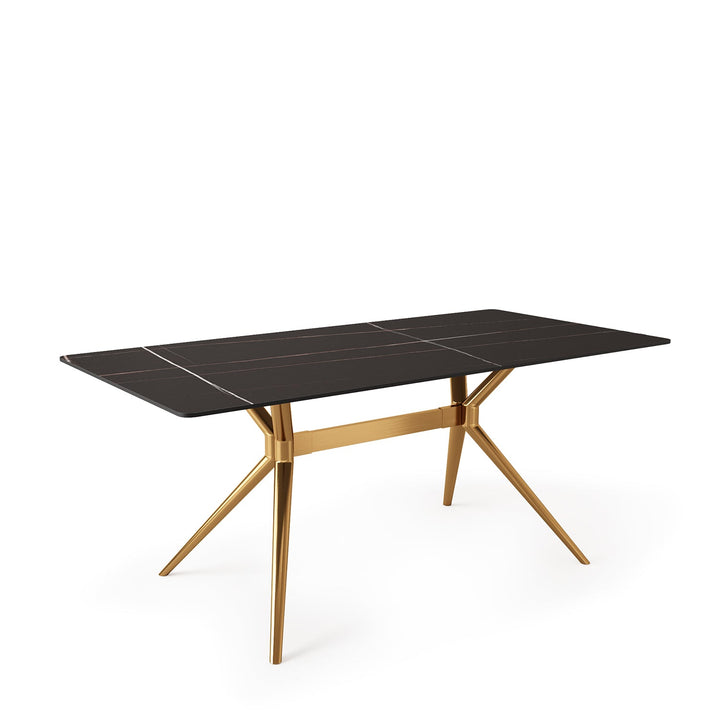 Modern sintered stone dining table spider gold in still life.