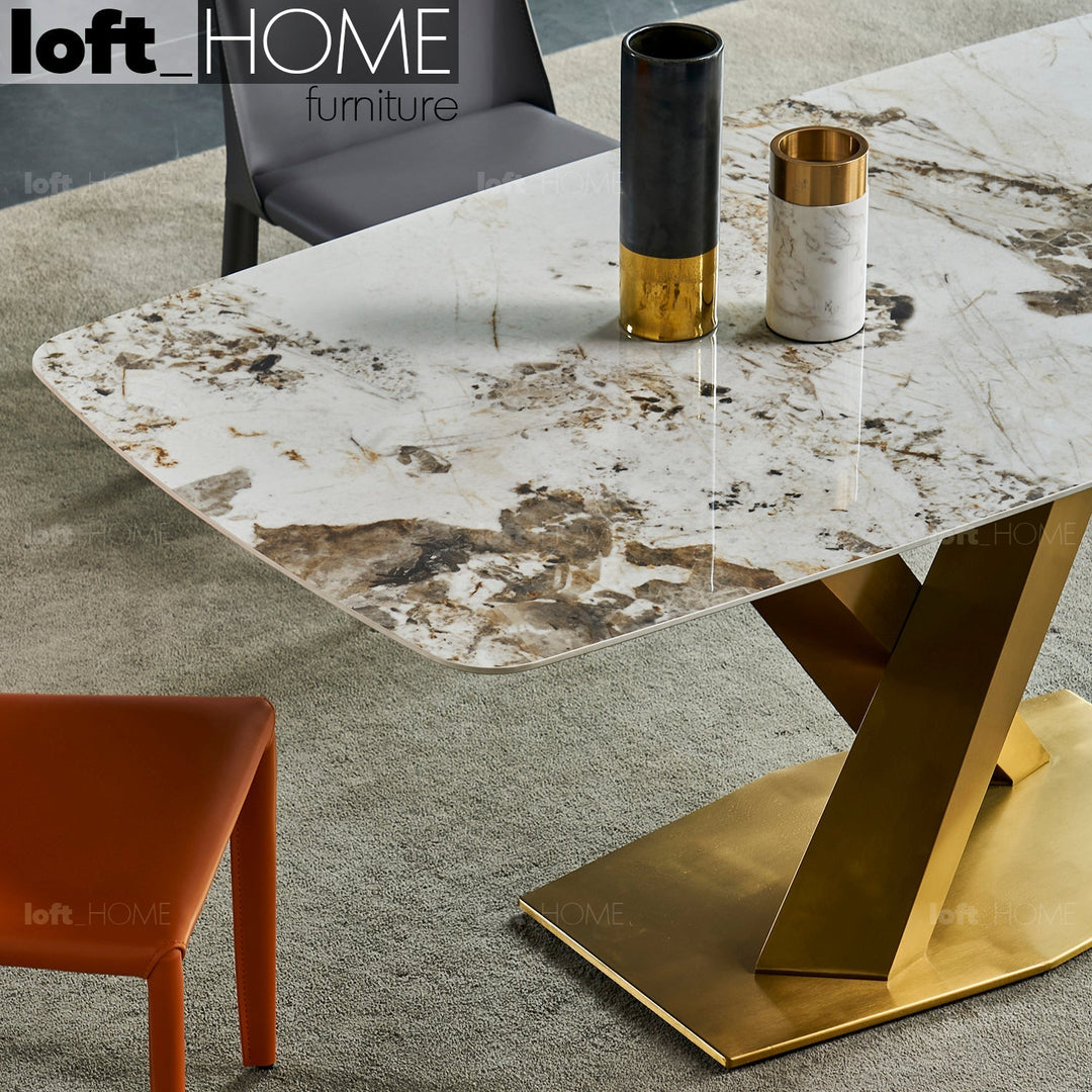 Modern sintered stone dining table stratos gold in close up details.