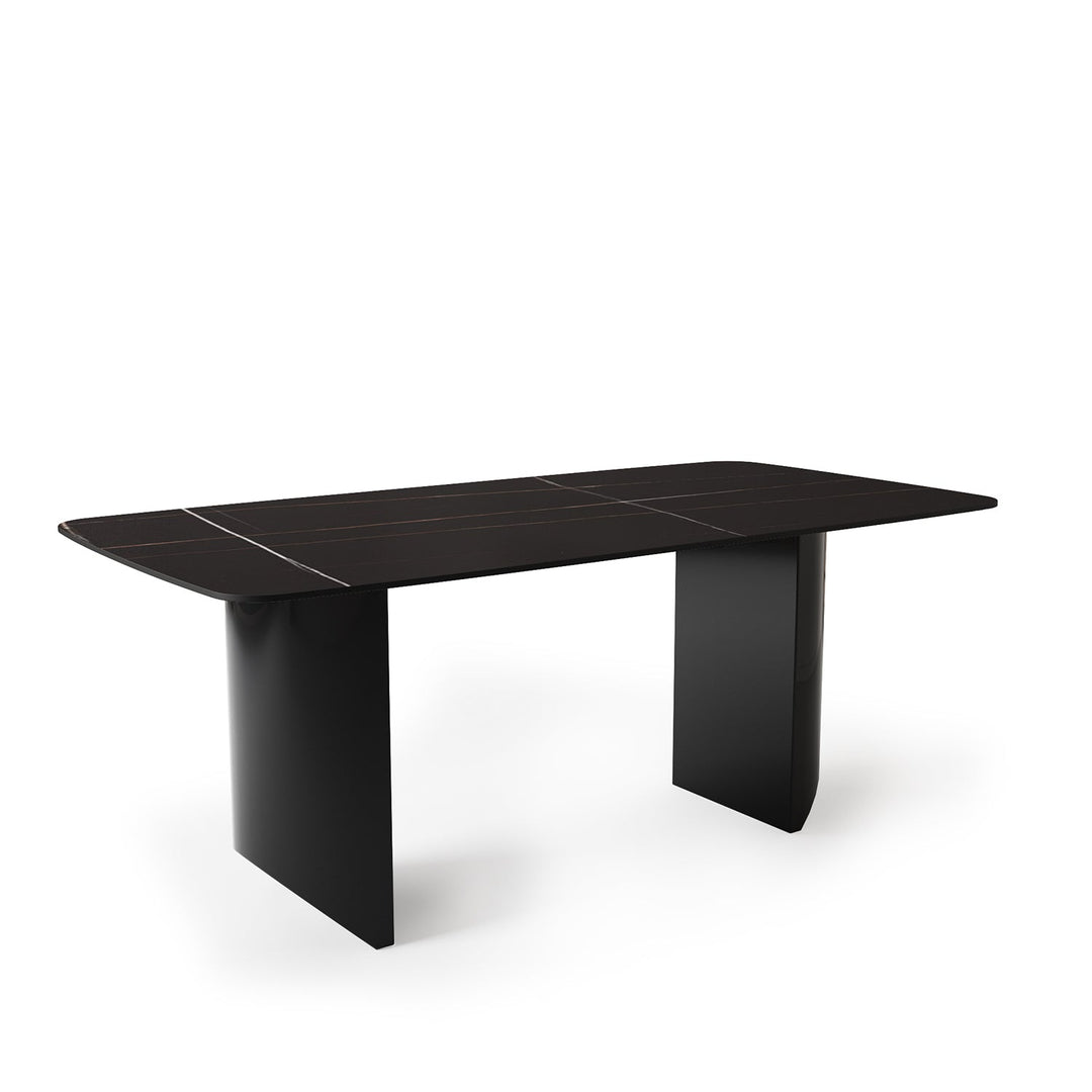 Modern sintered stone dining table wedge black in still life.