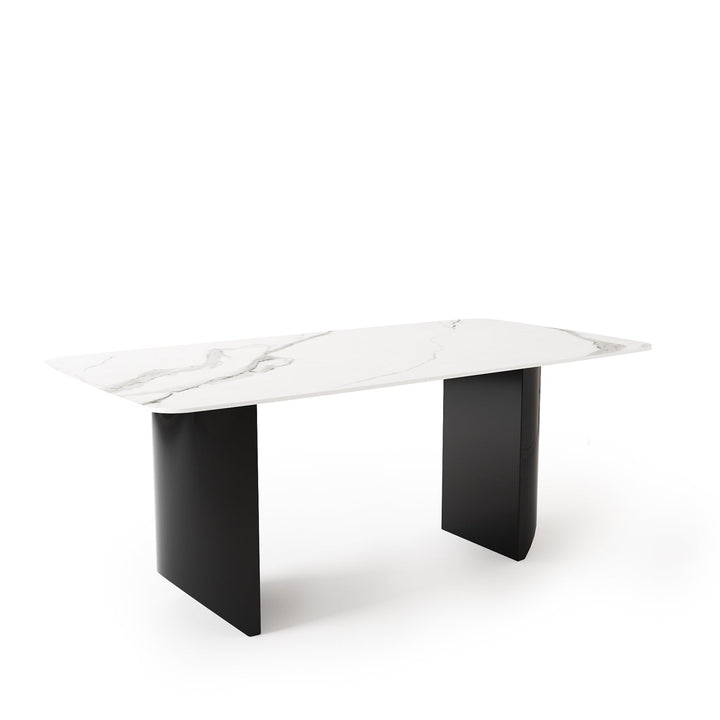 Modern sintered stone dining table wedge black in panoramic view.