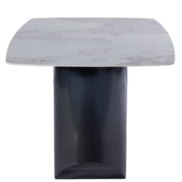 Modern sintered stone dining table wedge black in details.