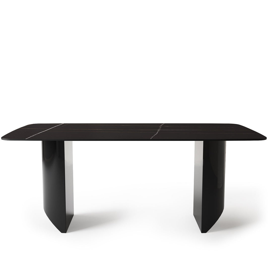 Modern sintered stone dining table wedge black in white background.